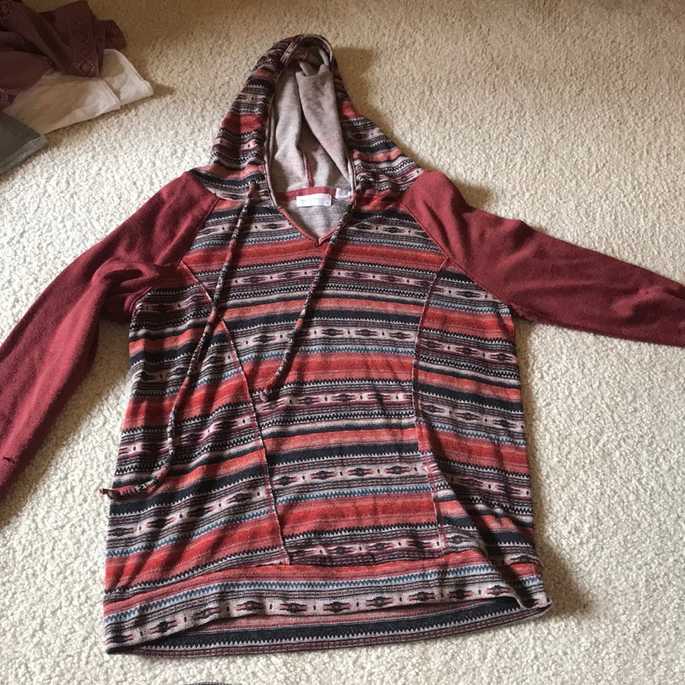 Sweatshirt material but looks like drug-rug shirt